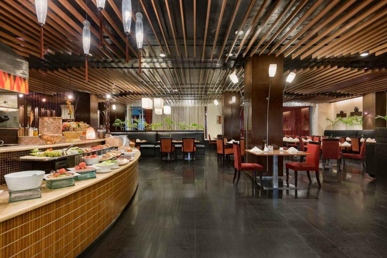 รามาดา พลาซา บาย วินด์แฮม การาจีแอร์พอร์ต โฮเต็ล Hotel ภายนอก รูปภาพ The restaurant